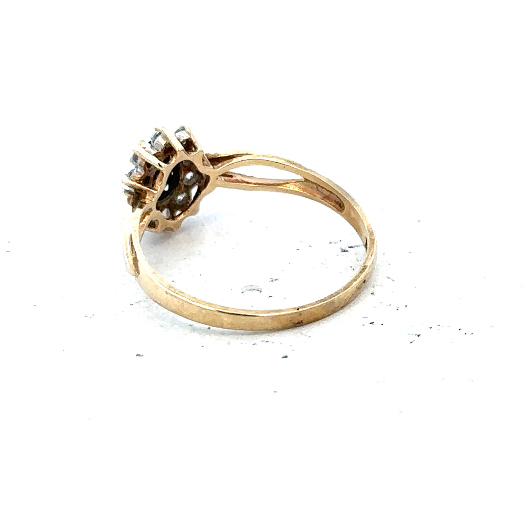 9ct yellow gold ring in size L with a smooth band, unbranded, displayed on a neutral background.