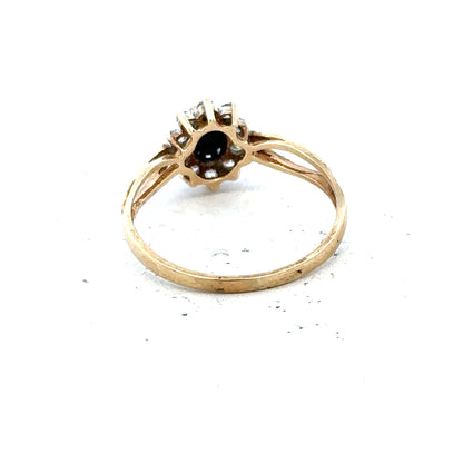 9ct yellow gold ring in size L with a smooth band, unbranded jewelry piece displayed against a neutral background.