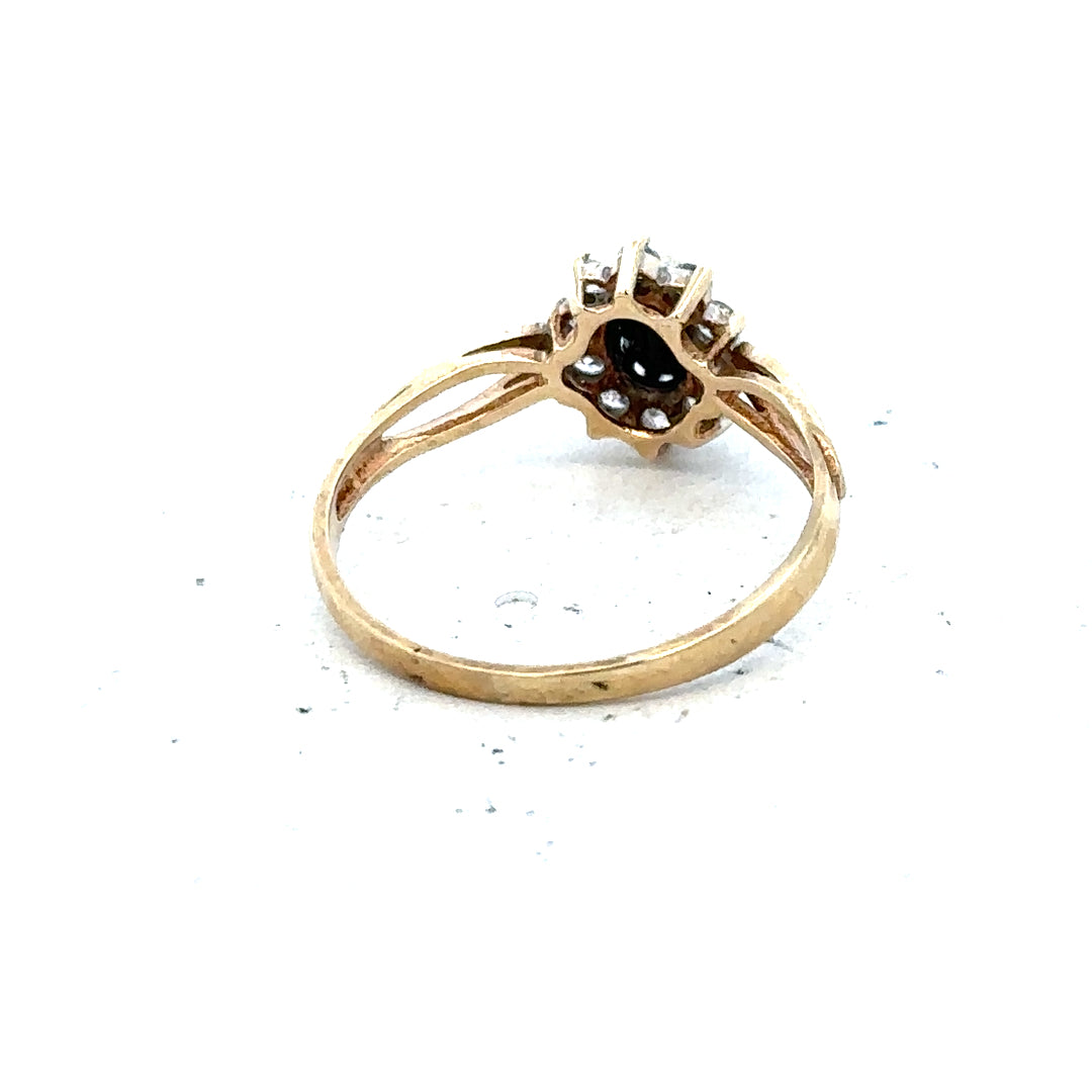 9ct yellow gold ring in size L with a smooth polished finish, unbranded, displayed on a neutral background.