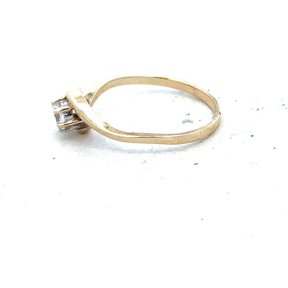 9ct yellow gold ring size L, unbranded, showcasing a smooth, polished band with a classic design.