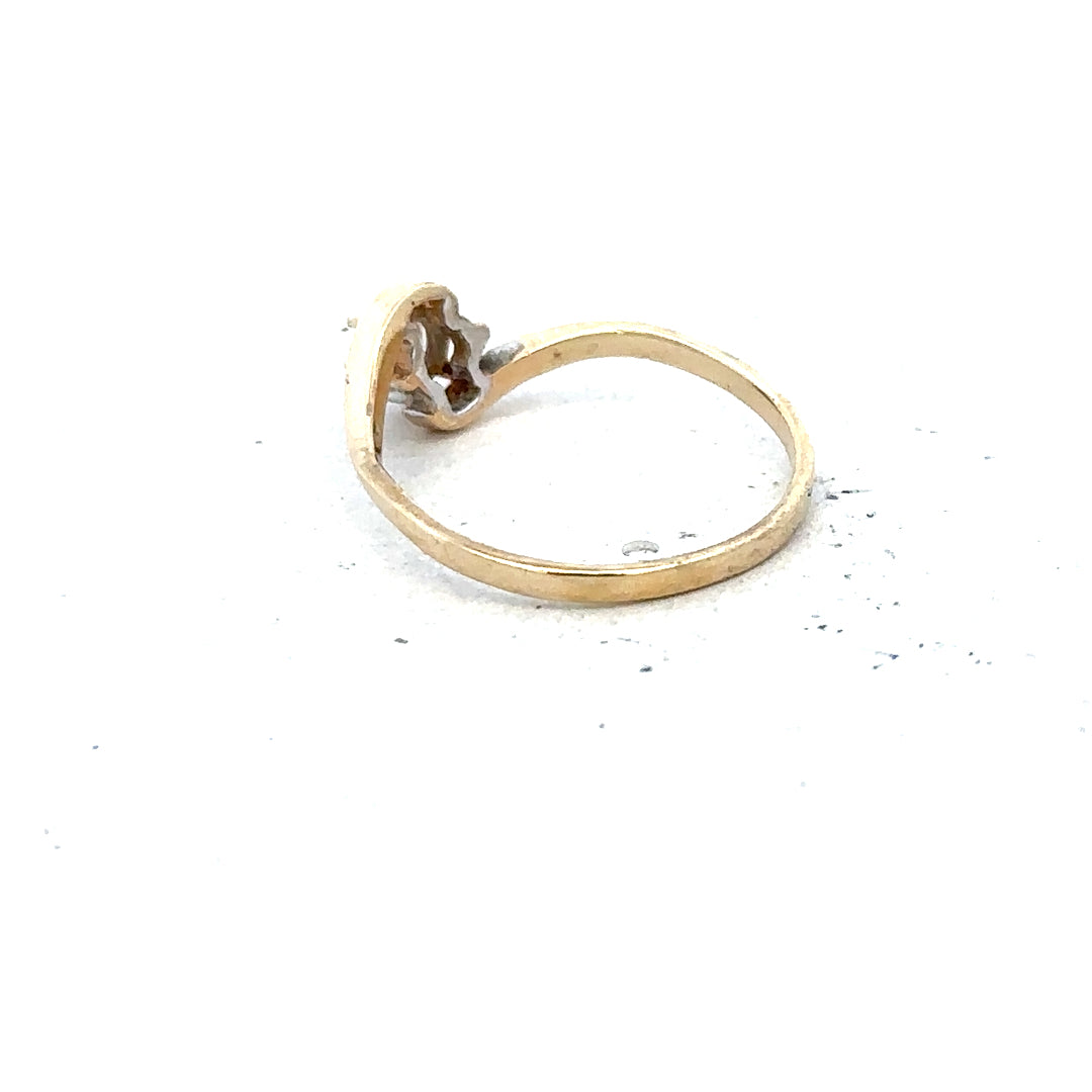 9ct yellow gold ring in size L with a smooth band, unbranded jewelry piece displayed against a neutral background.