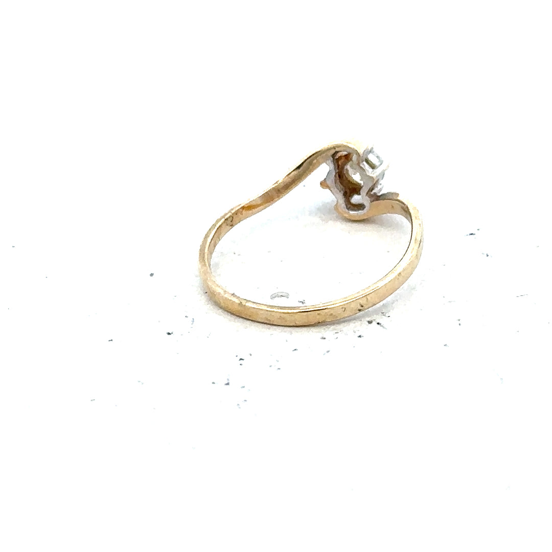 9ct yellow gold ring in size L with a smooth band, unbranded jewelry piece displayed on a neutral background.