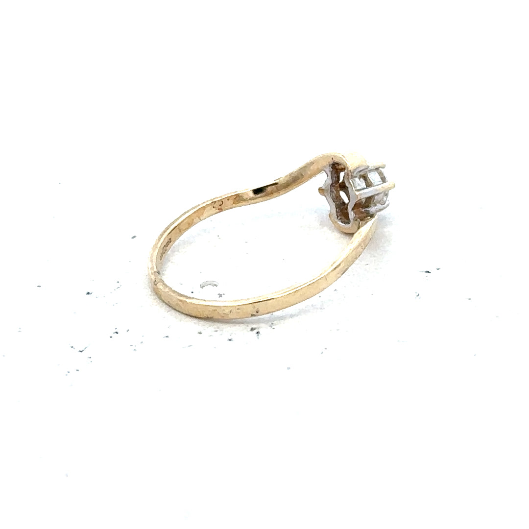 9ct yellow gold ring in size L with a smooth band, unbranded, showcasing a classic and elegant jewelry design.