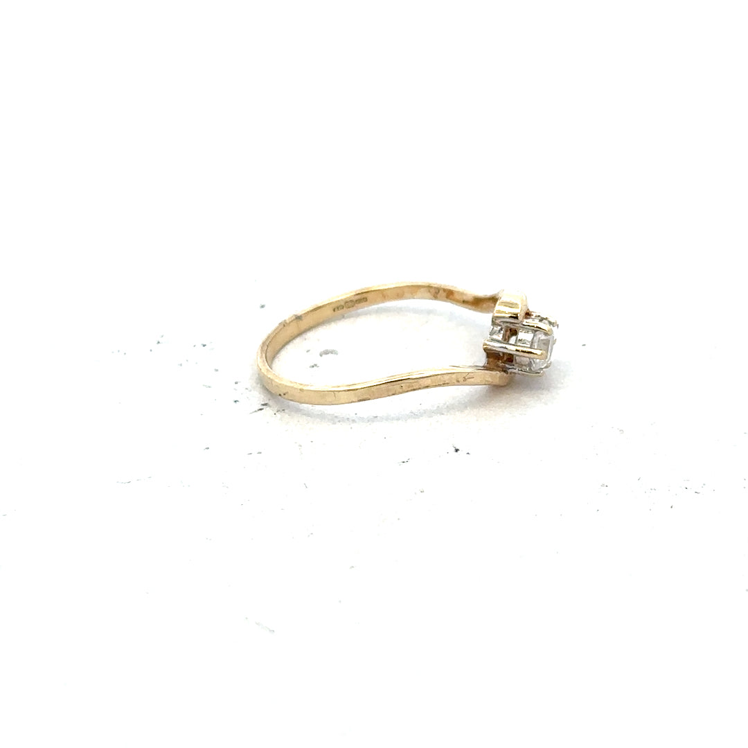 9ct yellow gold ring size L with a smooth band, unbranded, showcasing a classic and elegant jewelry design.