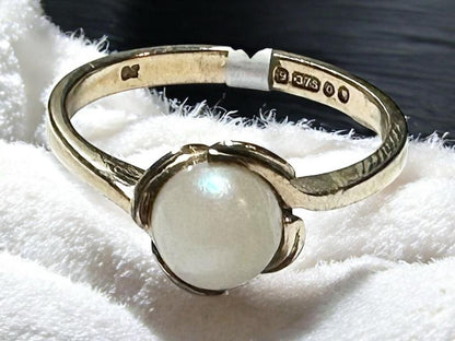 9ct yellow gold ring in size L1/2 with a smooth band, unbranded, shown on a plain background.