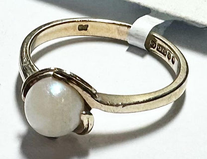 9ct yellow gold ring in size L1/2 with a smooth polished finish, unbranded jewelry accessory.