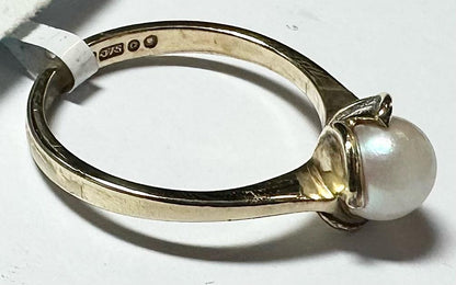9ct yellow gold ring in size L 1/2, unbranded jewelry with a smooth polished finish, displayed against a neutral background.