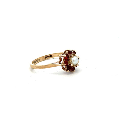 9ct yellow gold ring size L 1/2, unbranded jewelry with a smooth band, shown in a close-up image.