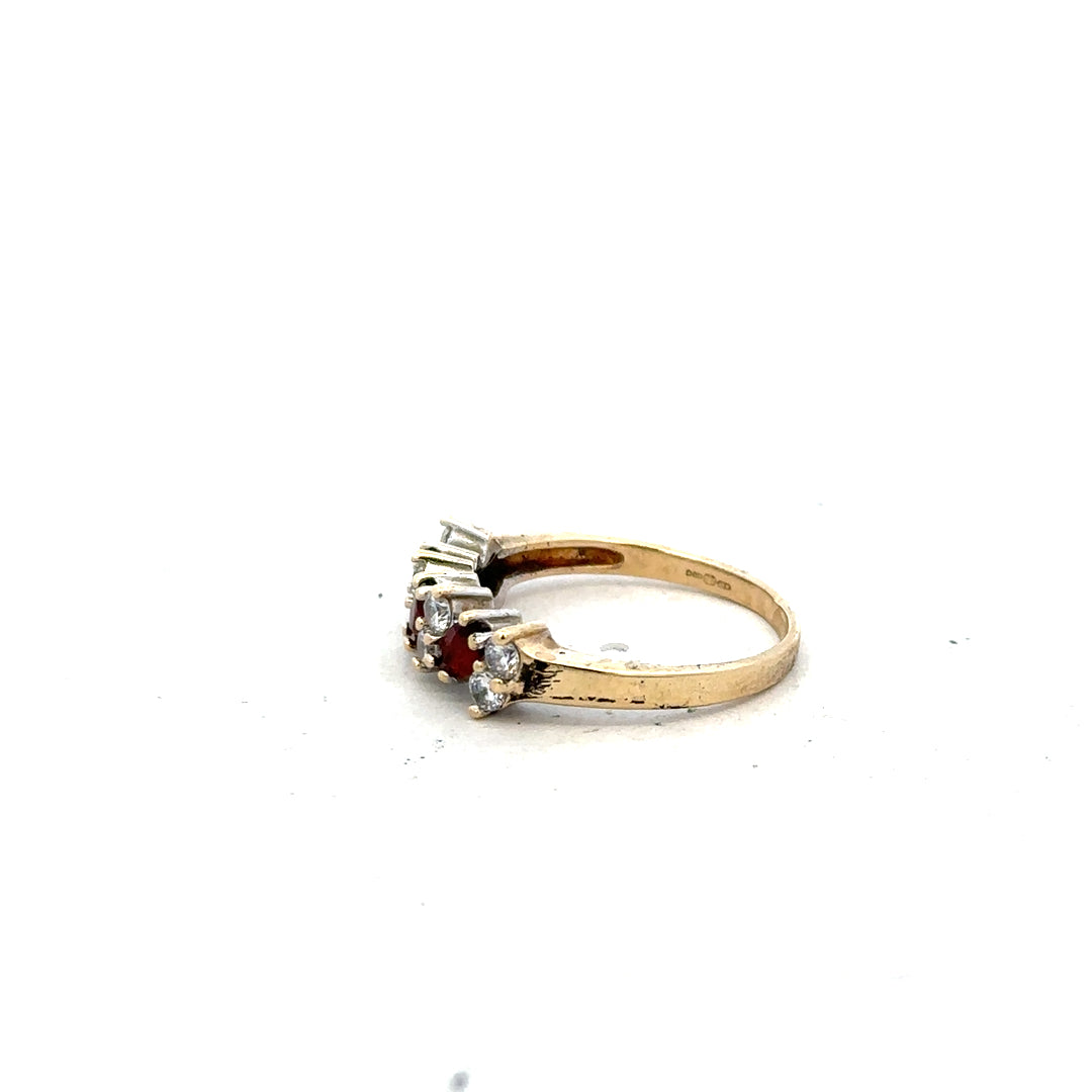 9ct yellow gold ring size L1/2, unbranded jewelry with a smooth band, shown in a close-up image.