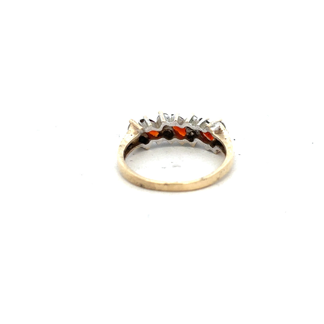 9ct yellow gold ring in size L 1/2 with a smooth band, unbranded jewelry, shown in a close-up image.