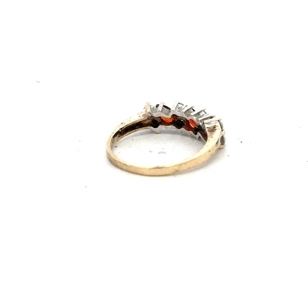 9ct yellow gold ring size L1/2, unbranded, featuring a smooth band design, shown in a close-up image.