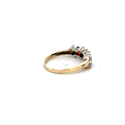 9ct yellow gold ring in size L 1/2 with a smooth band, unbranded jewelry displayed against a neutral background.