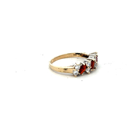 9ct yellow gold ring in size L 1/2 with a simple band design, unbranded jewelry displayed on a plain background.