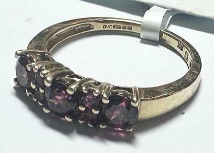 9ct yellow gold ring in size M with a smooth band, unbranded, showcasing a polished finish and classic design.