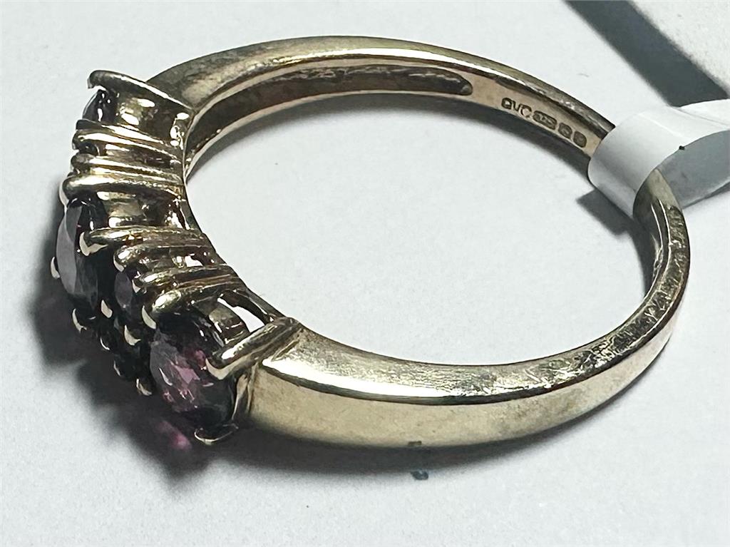 9ct yellow gold ring in size M with a simple polished band, unbranded jewelry piece.