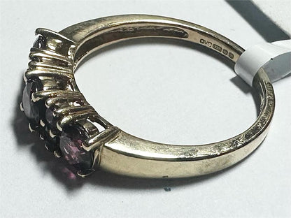 9ct yellow gold ring in size M with a simple polished band, unbranded jewelry piece.