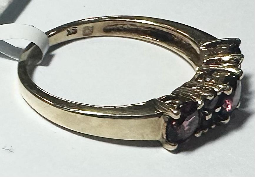 9ct yellow gold ring in size M with a smooth band, unbranded jewelry, showcasing its elegant, polished finish.