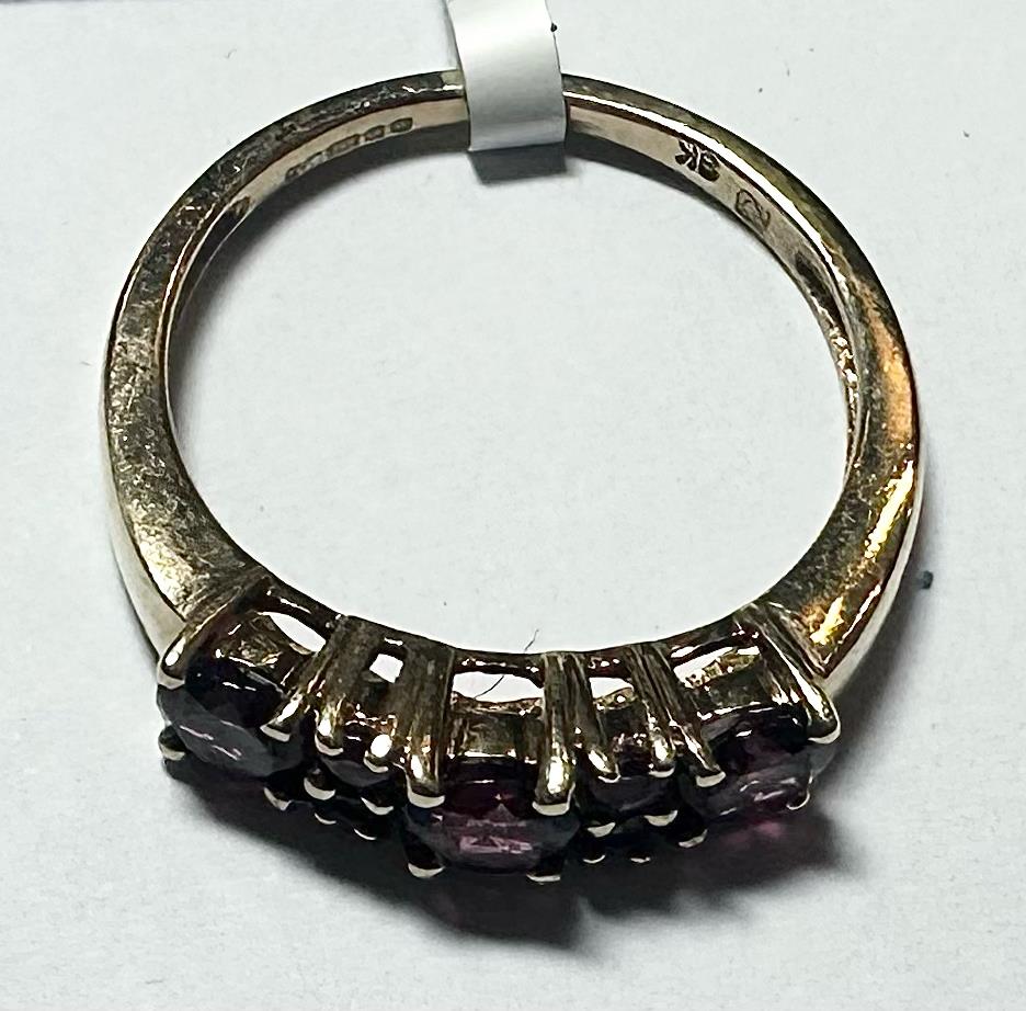 9ct yellow gold ring in size M with a simple, smooth band, unbranded jewelry for elegant everyday wear.