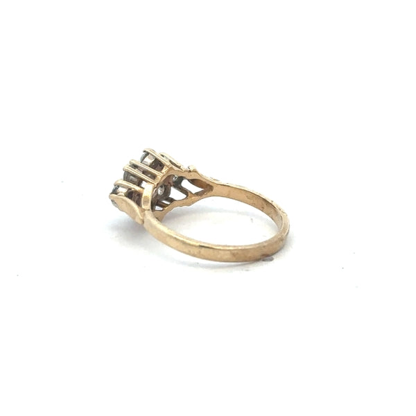 9ct yellow gold ring in size M with a smooth band, unbranded, shown in a close-up image highlighting its polished finish.