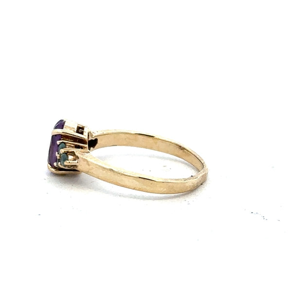 9ct yellow gold ring in size M with a smooth band, unbranded jewelry piece displayed on a plain background.