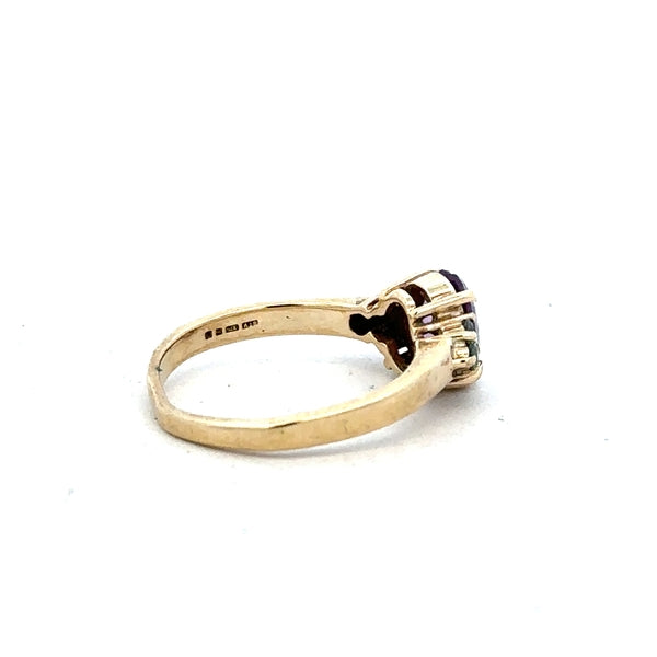 9ct yellow gold ring in size M with a smooth band, unbranded jewelry, shown on a plain background.