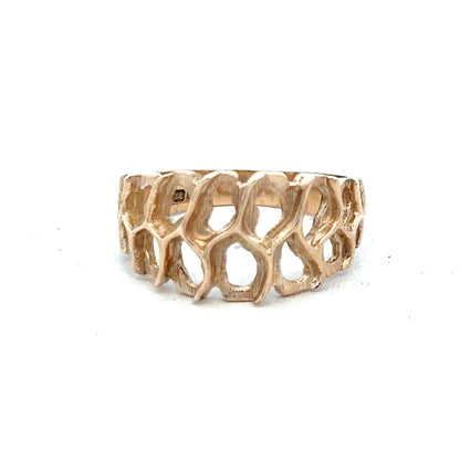 9ct yellow gold ring in size M with a smooth band, unbranded jewelry showing a close-up of the ring's polished surface.