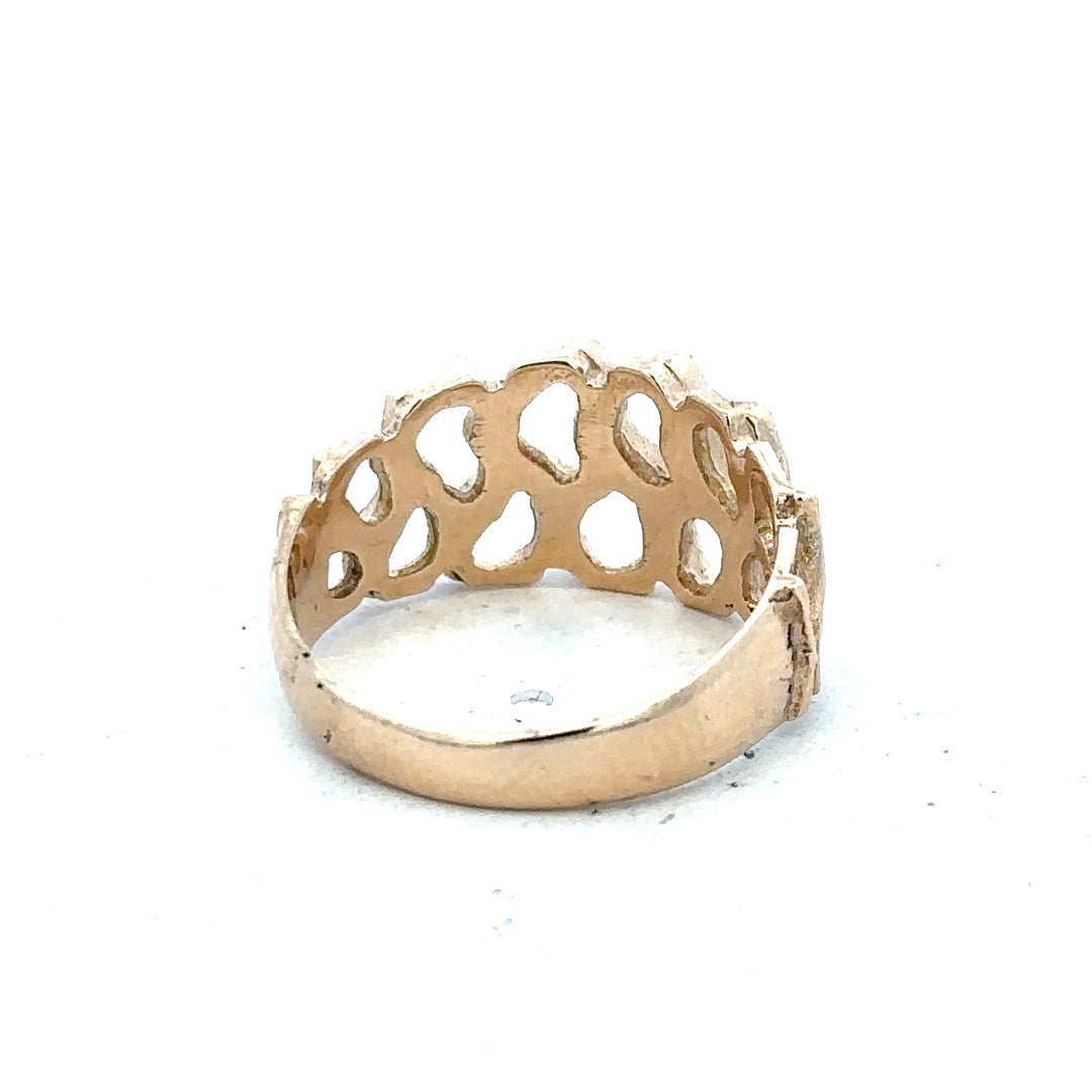9ct yellow gold ring in size M with a simple band design, unbranded, shown in close-up detail.