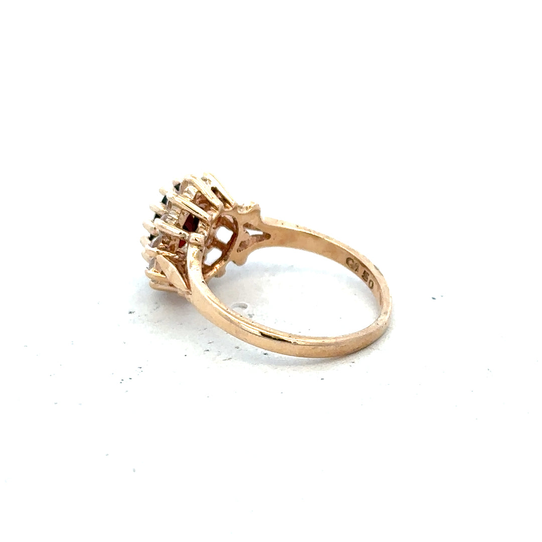 9ct yellow gold ring in size M, unbranded, with a smooth polished band, shown in a close-up image.