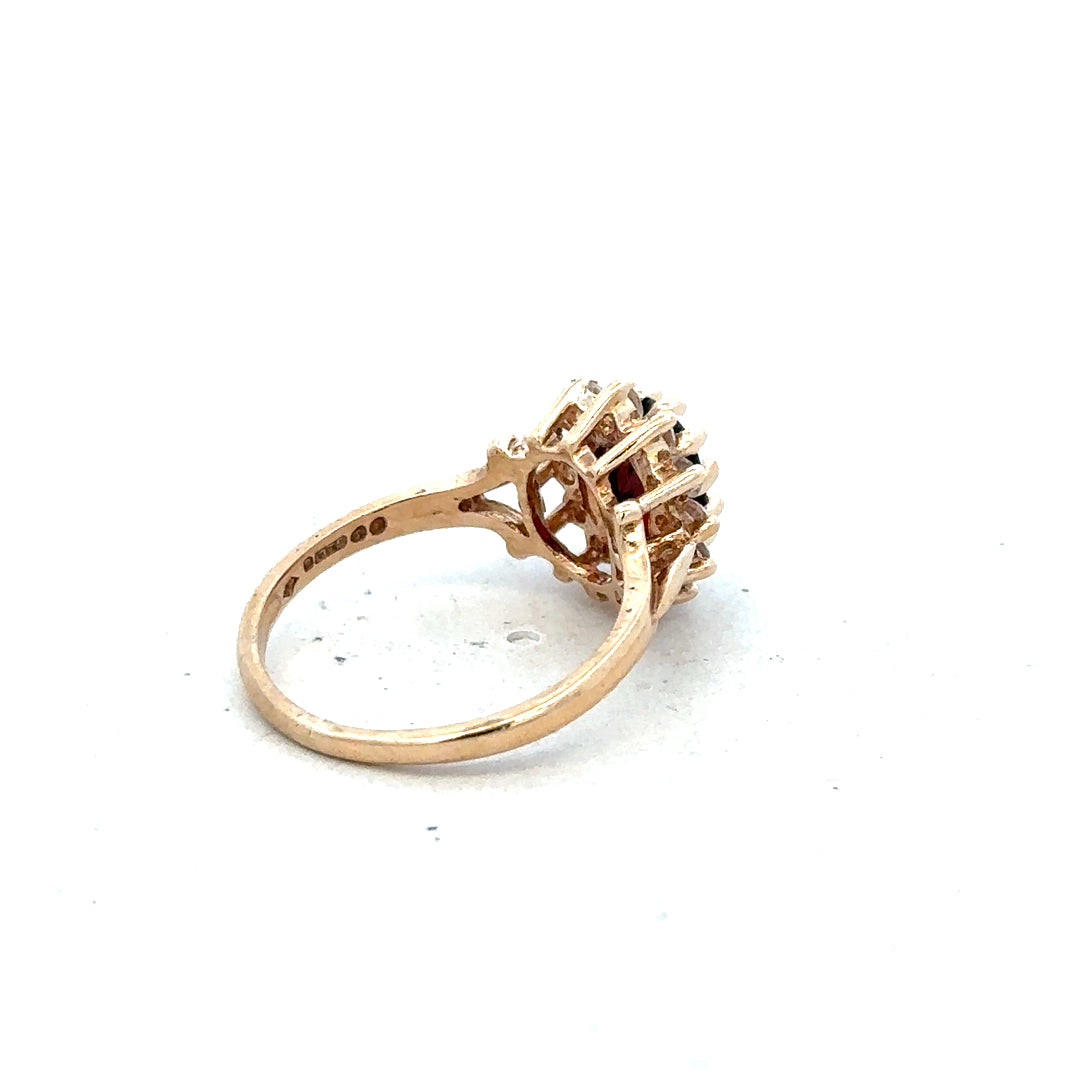 9ct yellow gold ring in size M with a smooth band, unbranded jewelry piece, shown from a front view.
