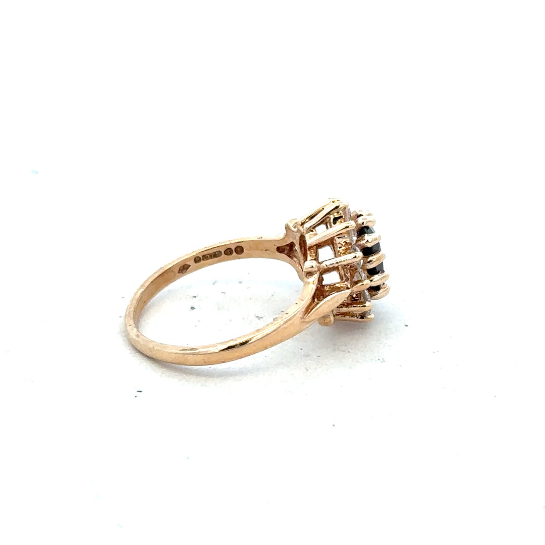 9ct yellow gold ring in size M with a smooth band, unbranded jewelry piece, shown close-up against a plain background.