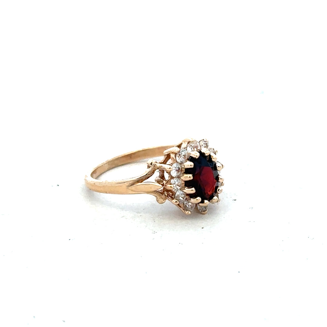 9ct yellow gold ring size M with a smooth band, unbranded jewelry piece, shown on a plain background.