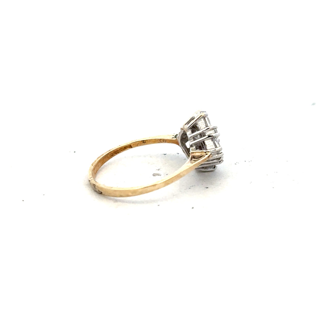9ct yellow gold ring in size M with a smooth band, unbranded jewelry piece, shown on a white background.
