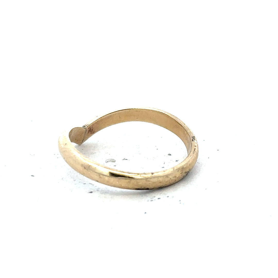 9ct yellow gold ring in size M with a smooth band, unbranded, showcasing a shiny, polished finish.