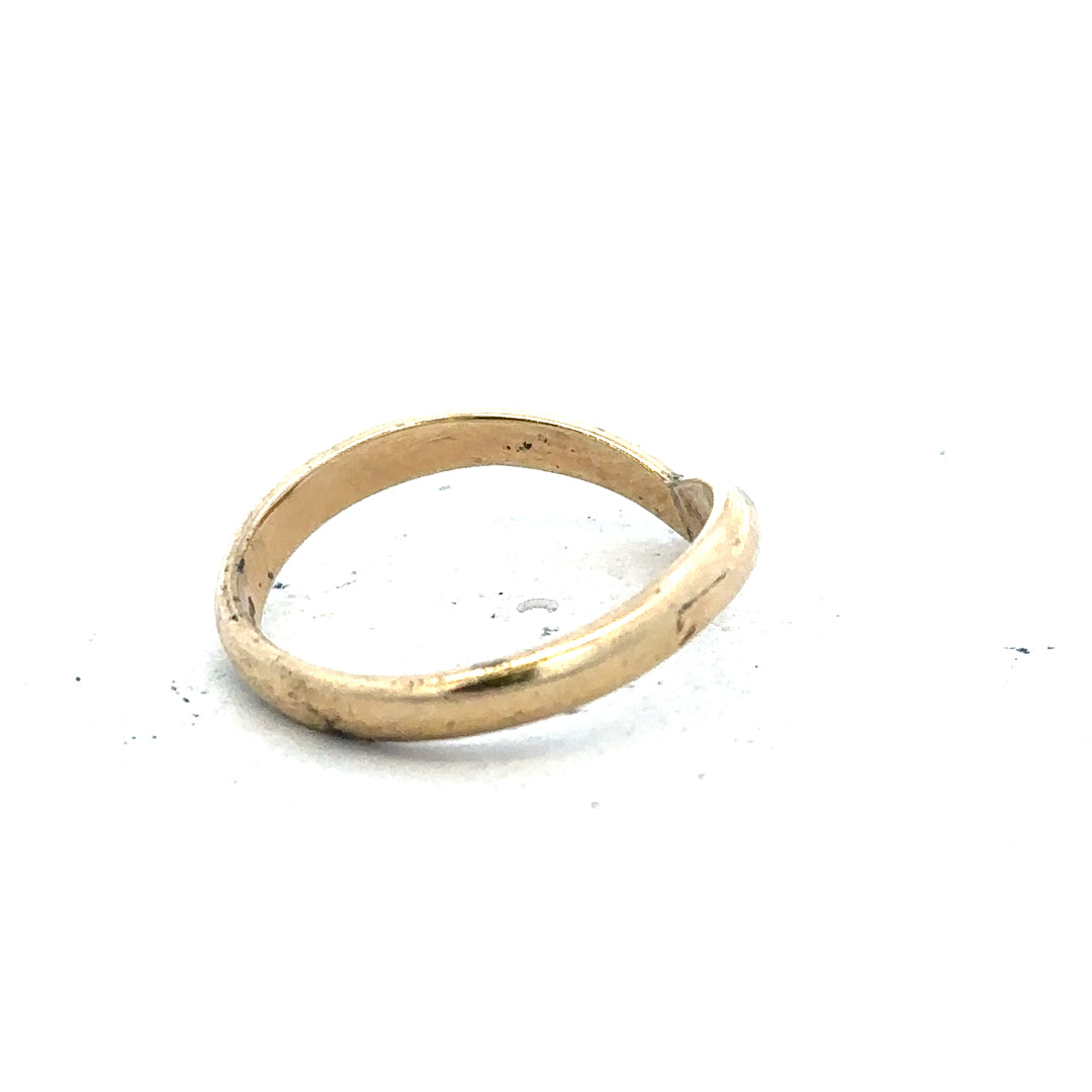 9ct yellow gold ring in size M with a smooth band, unbranded jewelry piece displayed on a plain background.