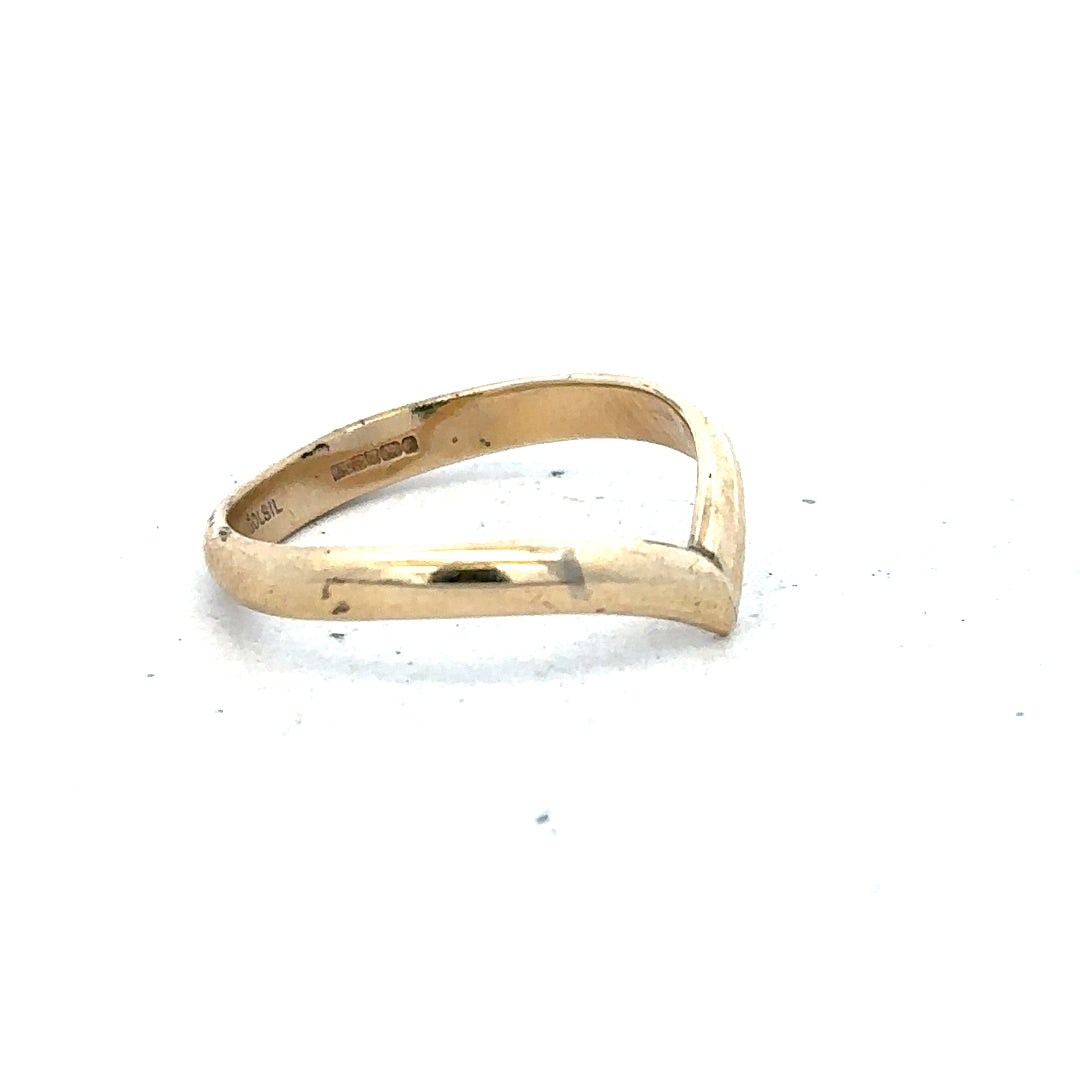 9ct yellow gold ring in size M with a smooth band, unbranded jewelry, displayed on a neutral background.