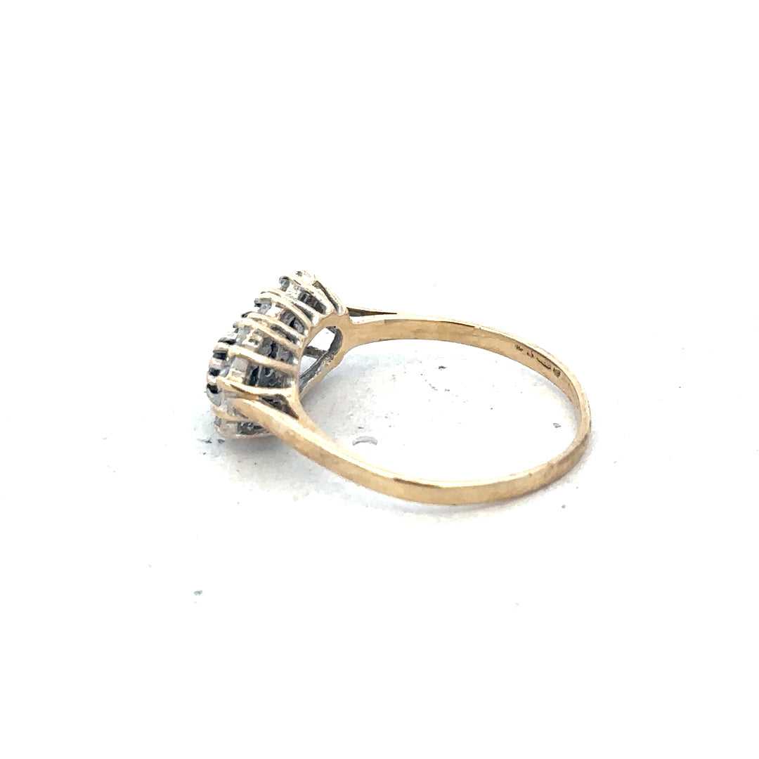 9ct yellow gold ring in size M with a smooth band, unbranded jewelry piece displayed on a neutral background.