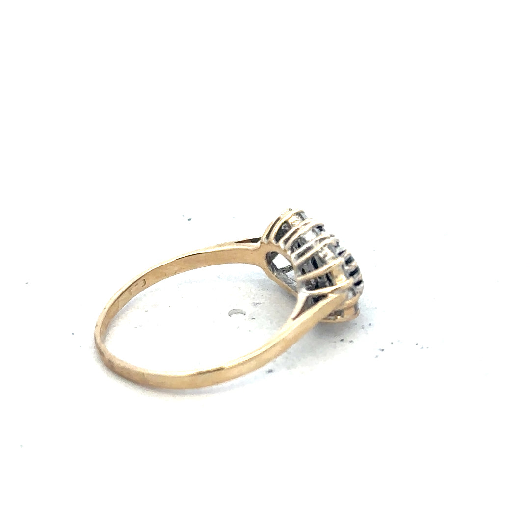 9ct yellow gold ring in size M with a smooth polished finish, unbranded jewelry displayed on a plain background