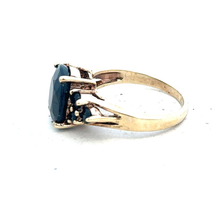 9ct yellow gold ring size M1/2 with a simple band design, unbranded, shown in a close-up view.
