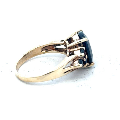 9ct yellow gold ring size M1/2 with a smooth band, unbranded jewelry, shown in a close-up image.
