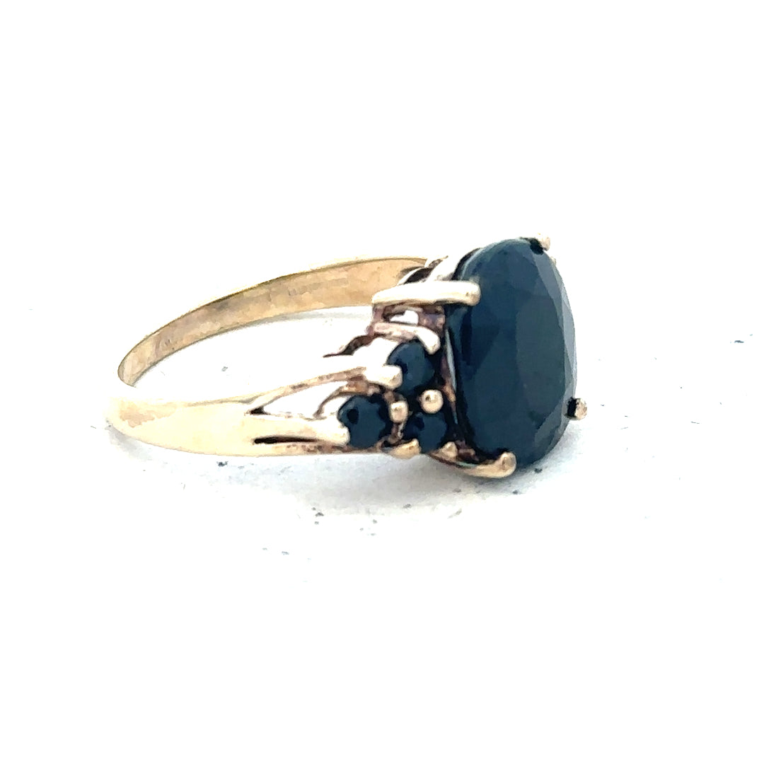 9ct yellow gold ring size M1/2 with a smooth band, unbranded jewelry piece, shown in a close-up image.