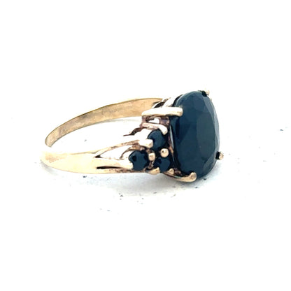 9ct yellow gold ring size M1/2 with a smooth band, unbranded jewelry piece, shown in a close-up image.