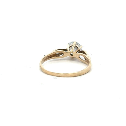9ct yellow gold ring in size M1/2 with a polished finish, featuring a simple band design.