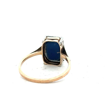 9ct yellow gold ring in size N, featuring a smooth band design, unbranded jewelry photographed against a neutral background.