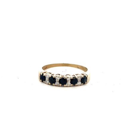 Yellow gold ring in size N, unbranded 9ct gold jewelry, smooth band with polished finish, shown against a neutral background.
