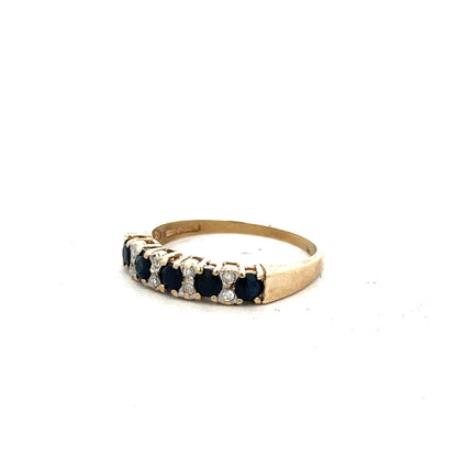 9ct yellow gold ring size N with smooth band, unbranded jewelry piece displayed against a plain background.