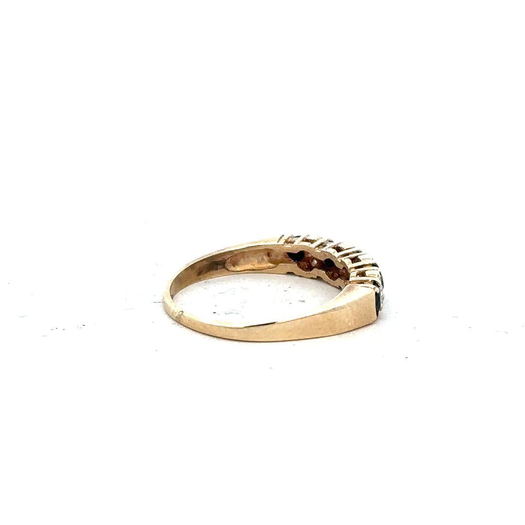 9ct yellow gold ring in size N with a smooth polished finish, showcasing elegant jewelry craftsmanship.