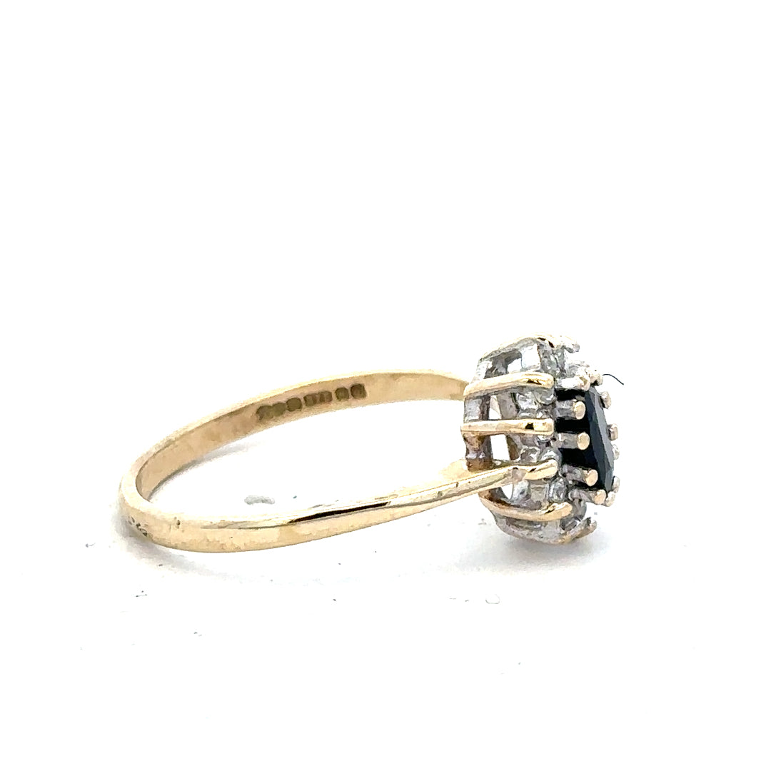 9ct yellow gold ring in size N with a smooth band, unbranded, shown in a close-up view highlighting its polished finish.