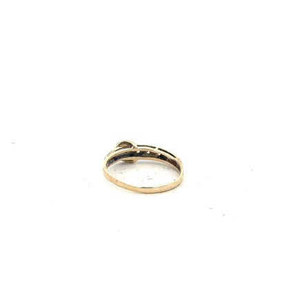 9ct yellow gold ring in size N, featuring a smooth polished band, unbranded jewelry, shown in a close-up image.