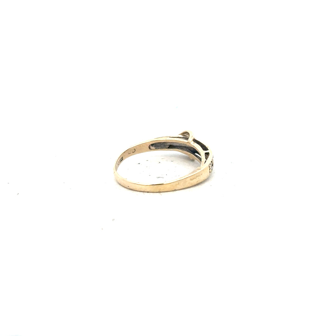 Yellow gold ring in size N with a simple band, unbranded, made from 9ct gold, displayed on a neutral background.