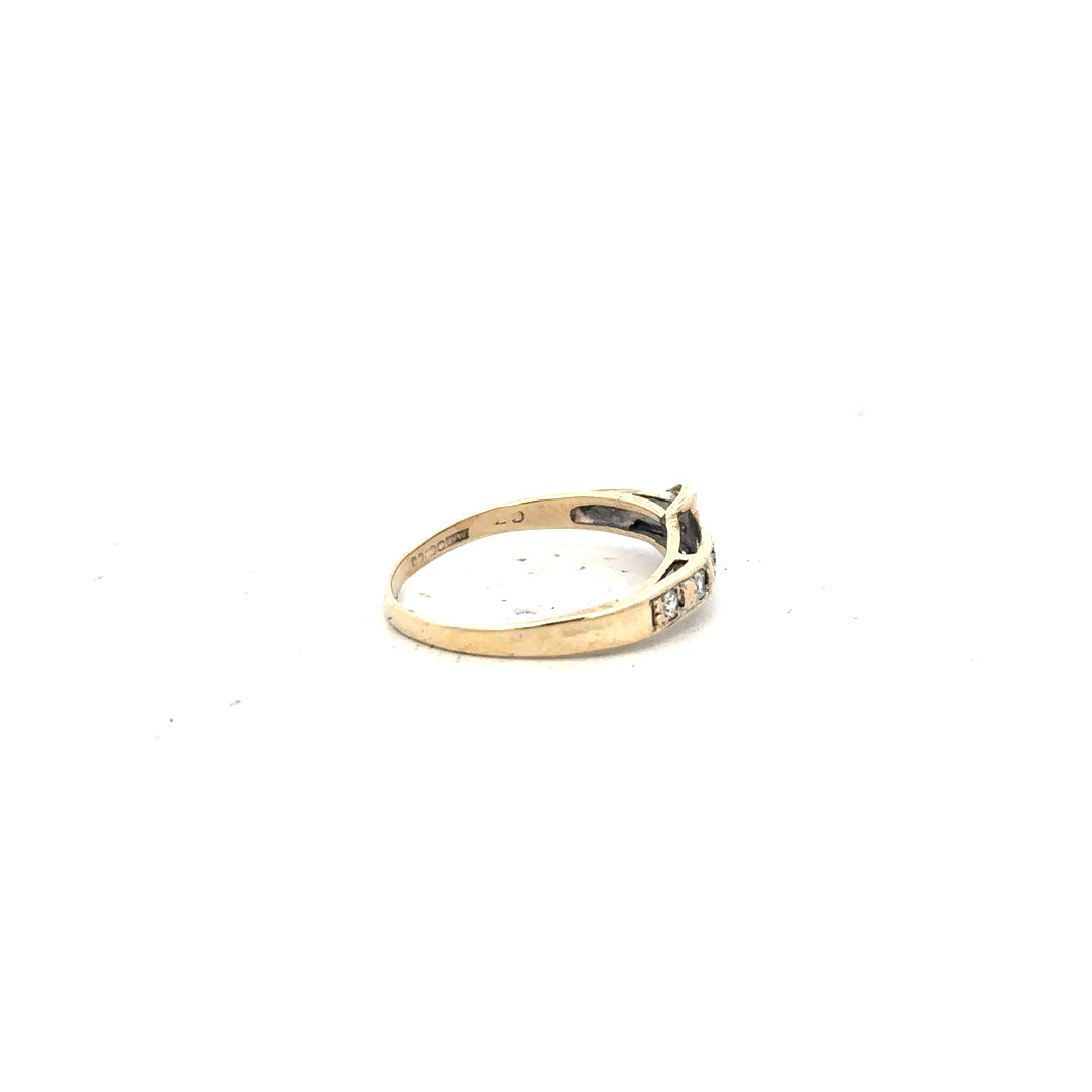 9ct yellow gold ring size N with a smooth band, unbranded jewelry piece displayed on a plain background.
